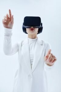 woman in white suit wearing black VR glasses top 5 best skills