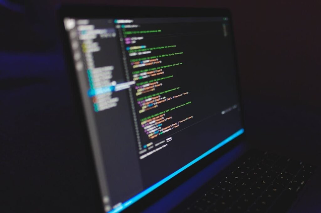 black cumputer with coding
